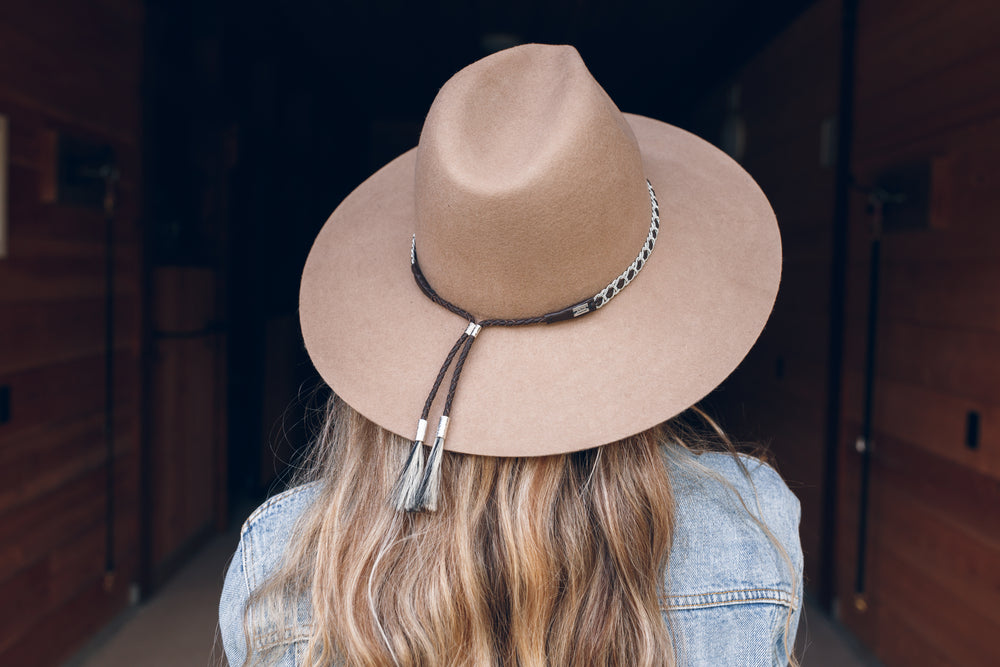 women wearing hat with thin high end hat band, brown reindeer leather, Simply Sami Jewelry, Pemberton BC