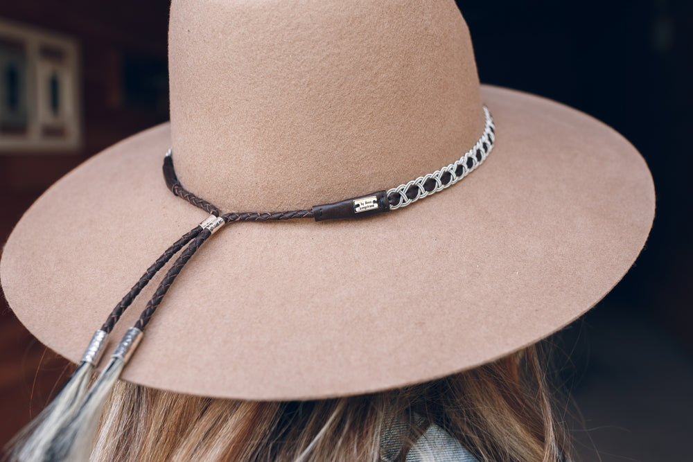 women wearing hat with thin high end hat band, brown reindeer leather, Simply Sami Jewelry, Pemberton BC