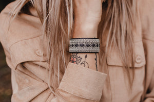 Woman wearing tennarmband bracelet, Cloud Burst, Reindeer leather, Sami Bracelet,  Pemberton BC