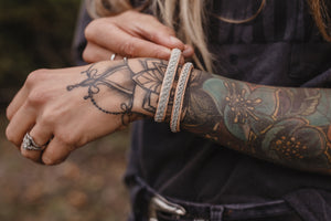 women wearing Sami, tan reindeer leather, Sami Bracelet, Tennarmband, Simply Sami Jewelry